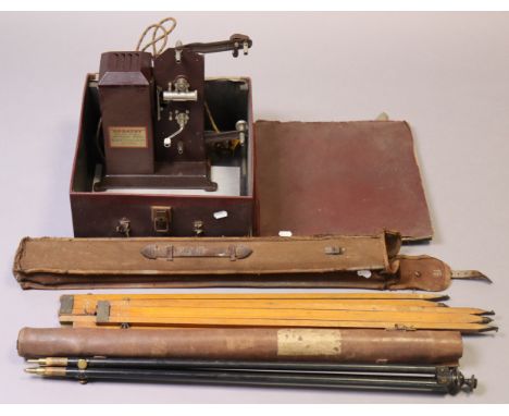 A Kodak “Kosatoy” universal model film projector; &amp; two vintage camera tripods, all cased.