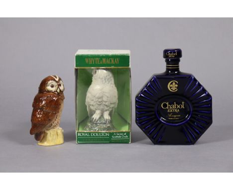 A Royal Doulton novelty ceramic “Snowy Owl” bottle of Whyte &amp; Mackay Scotch Whisky, with contents, boxed; together with a