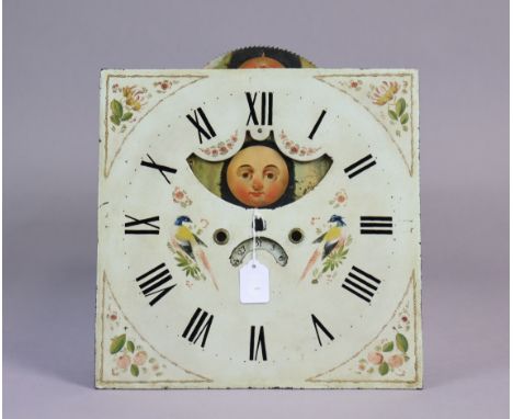 An antique enamelled metal longcase clock dial with painted exotic bird &amp; floral decoration, &amp; inset with moving moon