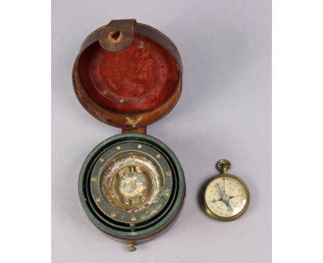 A WWI pilots pocket compass in a leather outer case; together with another compass in brass case.