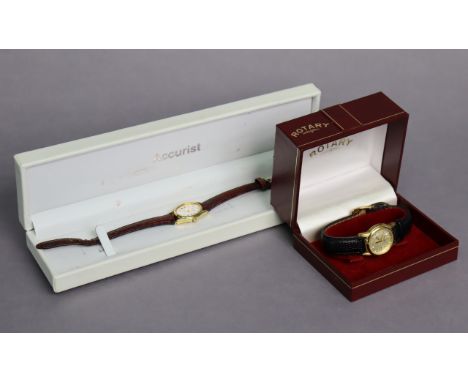 A Rotary Anniversary wristwatch with champagne dial, roman numerals, &amp; date aperture, with leather strap; &amp; an Accuri