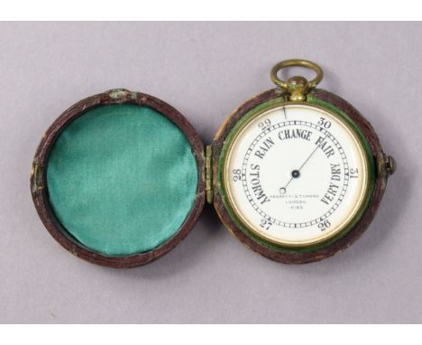 A vintage Negretti &amp; Zambra of London brass-cased pocket barometer (No. 10183), with a crimson morocco leather travelling
