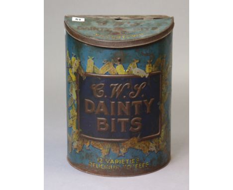 A vintage bow-fronted shop display tin “C. W. S. Dainty Bites Silvertown”, 11” wide x 15¼” high.