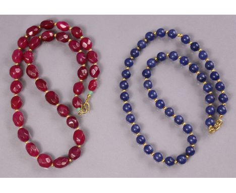 A necklace of facetted ruby beads, 21”; &amp; another of sapphire beads, 20”.