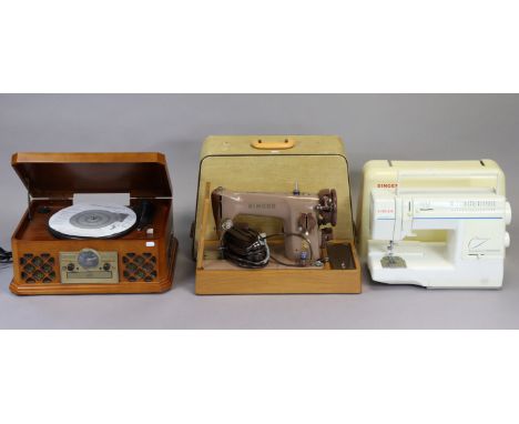 Two Singer electric sewing machines, each with case, &amp; a Zennox modern music system.