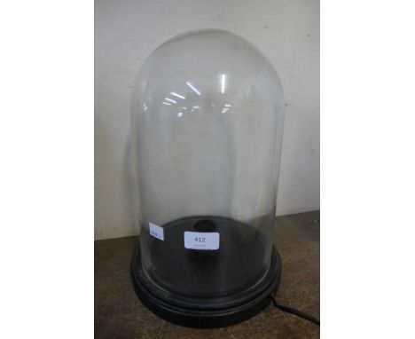 A glass dome table lamp