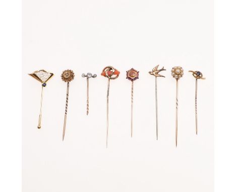 Eight gold stick pins including pearl cluster, diamonds, coral etc total 10.2g. *Condition: Various, the pin on the diamond p