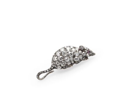 mounted overall with graduated old-cut diamonds, with cabochon ruby eye, in silver and backed in gold, 3cm long, 2.3 grams. *