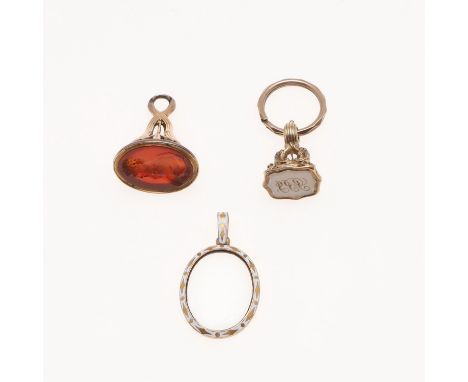 the body with scrolling foliate decoration, the chalcedony matrix engraved with initials, 2.0m high, together with another go