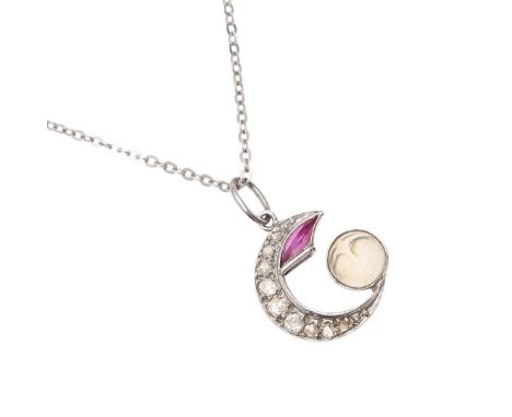 mounted with a carved moonstone, graduated old-cut diamonds and a ruby, 1.6cm high, on an 18ct white gold neckchain, 3.7 gram