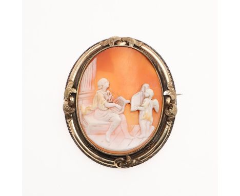 the cameo depicting a figure playing a lyre and an angel holding music, in gilt mount with scroll decoration 4.5cm x5.5cm, 27