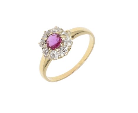 the circular-cut ruby is set within a surround of circular-cut diamonds, in yellow gold, 3.0 grams. Size P. *Condition: A cou