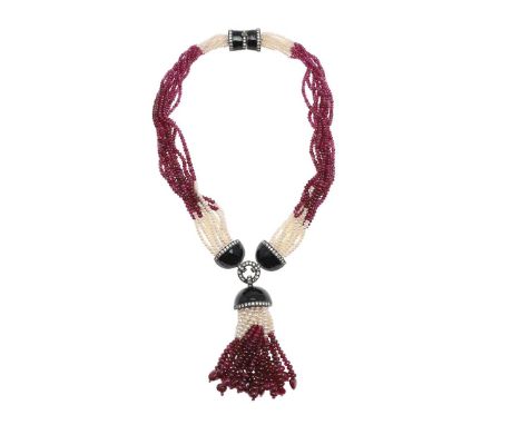 the multi strand seed pearls and rubies joined with black enamel terminals set with brilliant cut diamonds and with ruby and 