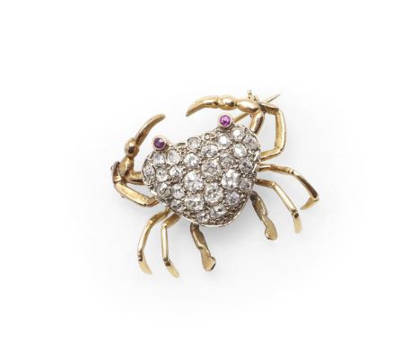 realistically formed, mounted with cushion-shaped and old-cut diamonds, in yellow gold, with circular-cut ruby eyes, 3cm wide