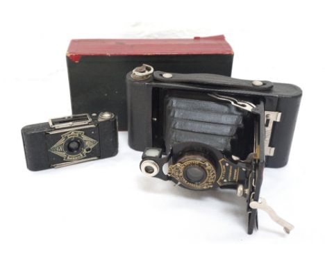 KODAK AUTOGRAPHIC NO. 2 FOLDING BROWNIE CAMERA
marked Lizars of Glasgow in original box, together with an Ensign Midget foldi