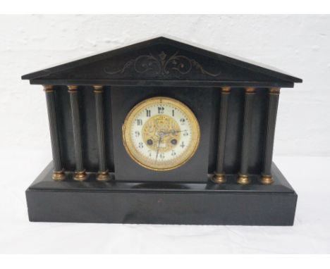 VICTORIAN BLACK SLATE MANTLE CLOCK
designed as a temple, the circular dial with Arabic numerals flanked by columns standing o