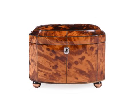 Y A REGENCY TORTOISESHELL VENEERED TEA CADDYCIRCA 1820With silver coloured plaque initialled M M, the hinged lid enclosing tw