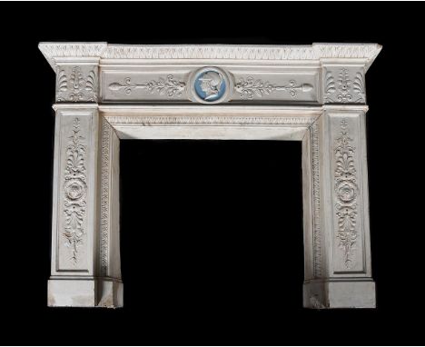 A WHITE GLAZED CERAMIC CHIMNEY PIECE IN GEORGE III STYLELATE 19TH OR EARLY 20TH CENTURYIn Neo-Classical taste, the central ro