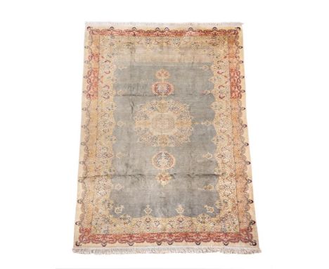A SILK HEREKE RUGApproximately 220 x 147cmCondition Report: The colours are muted overall and this appears to have faded, the