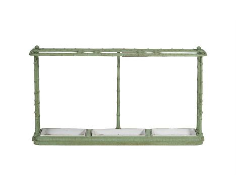 A FRENCH CAST IRON STICK STAND IN JAPONISME TASTELATE 19H CENTURYThe top with an arrangement of various apertures55cm high, 1