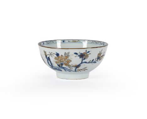 A CHINESE NANKING CARGO UNDERGLAZE BLUE AND GILT BOWLCIRCA 1750 the exterior decorated with a fence with peony  in gilt and o