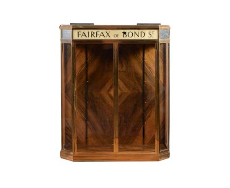 A GLAZED BRASS AND WALNUT VENEERED SHOP DISPLAY CABINETBY POLLARDS STOREFITTERS, LONDON, PARIS, BRUSSELLSThe top panel inscri