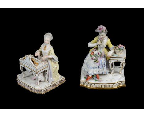 A PAIR OF MEISSEN MODELS EMBLEMATIC OF THE SENSES FROM A SET OF FOURLATE 19TH CENTURY'Smell' and 'Sound', blue crossed swords