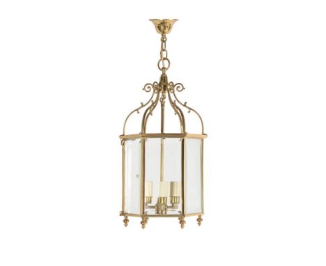 A GILTMETAL AND GLAZED HALL LANTERN IN REGENCY STYLE20TH CENTURYOf hexagonal form63cm high