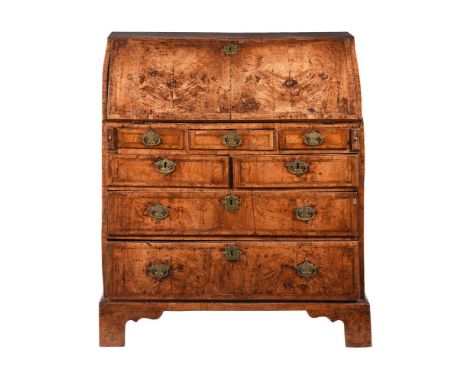 A WALNUT BUREAUEARLY 18TH CENTURY 104cm high, 92cm wide, 48cm deep Condition Report: Marks, knocks, scratches, abrasions cons