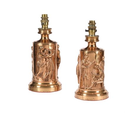 A PAIR OF POLISHED BRONZE LAMP BASES 19TH CENTURY AND LATEREach with a cylindrical body decorated with classical maidens27cm 