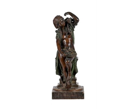 A GOLDSCHEIDER COLD PAINTED TERRACOTTA FIGURE OF A GIRL WITH MONKEYEARLY 20TH CENTURYImpressed marks, J. Rordeif to plinth, 4