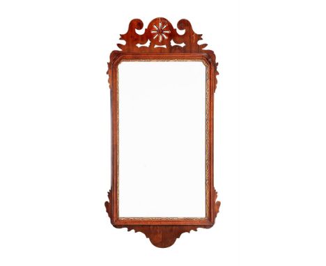 A GEORGE II WALNUT FRETWORK WALL MIRRORCIRCA 1740 95cm high, 48cm wideCondition Report: Marks, knocks, scratches, abrasions c