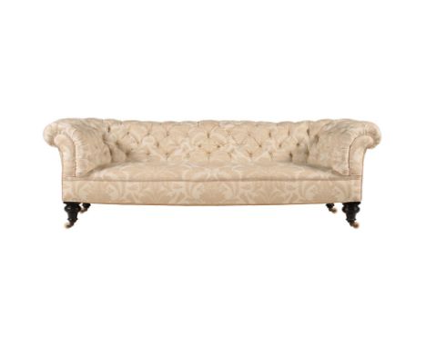 A VICTORIAN EBONISED AND UPHOLSTERED SOFACIRCA 1870 AND LATER UPHOLSTEREDOf Chesterfield type68cm high, 204cm wide, 79cm deep