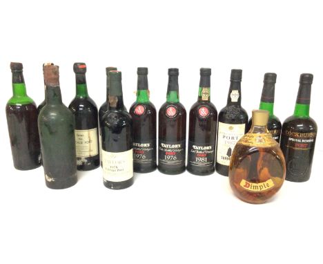 A collection of vintage ports and a bottle of dimple whisky. Port includes Dows Taylorâ€™s Cockburns. One bottle of port has 