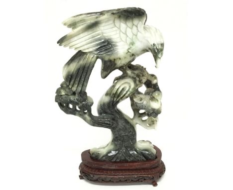 A boxed Jade eagle figure, 27cm tall. postage category D