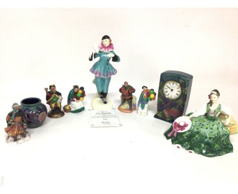 A collection of Moorcroft and Royal Doulton ceramics including a small Finches and Berries vase and clock. The Mask HN4141 fi