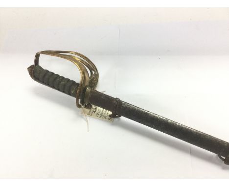 A 19th Century infantry officer's sword with brass basket hilt and scabbard. Shipping category C, within UK only.