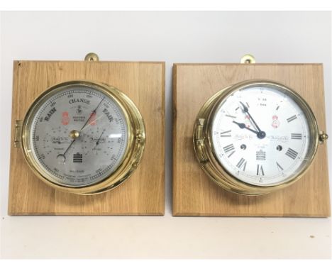 Sewills weather master and a Sewills Maker To The Admiralty clock postage category D.  NO RESERVE