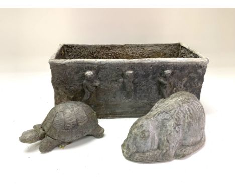 A cast lead planter together with a cast rabbit and tortoise. (D).