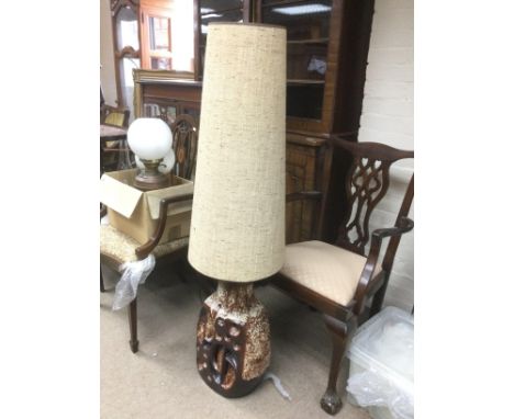 An art pottery standard lamp, approx height 136.5cm. Shipping category D.