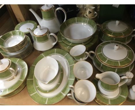 A Noritaki porcelain dinner set The Eroica set pattern 2041 decorated with green on white with tureens plates cups saucers te