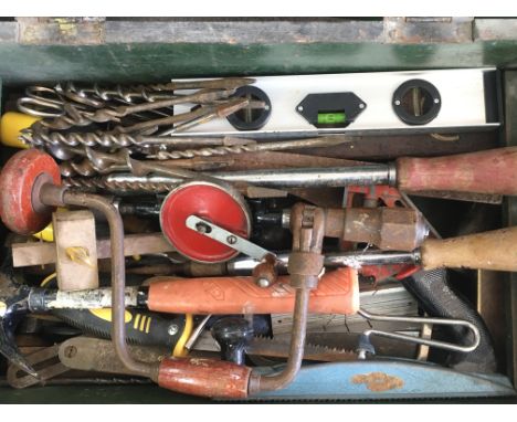 Wooden box of various carpenter tools and saws. Postage category D