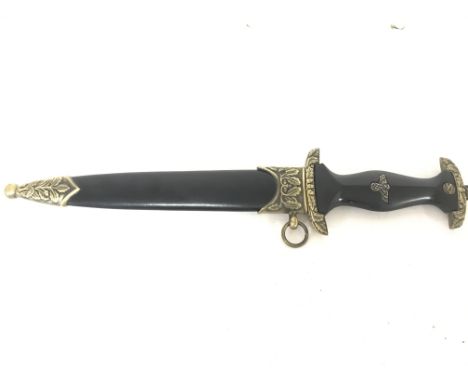 A replica of a German SA dagger with scabbard. 36cm long