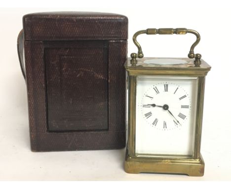 A cased French 8 Day brass Carriage clock with lever escapement, compensated balance wheel and jewelled movement. Circa 1870.