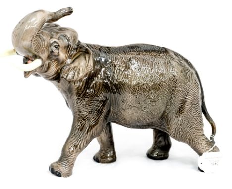 A Beswick Elephant - trunk in salute, model no. 1770, gloss 