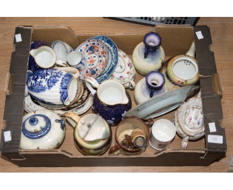 A collection of decorative ceramics to include: Copeland Spode, a Royal Worcester candle snuffer modelled as a young boy, a D