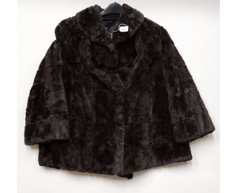 A vintage 1940s ladies fur short swing back coat 