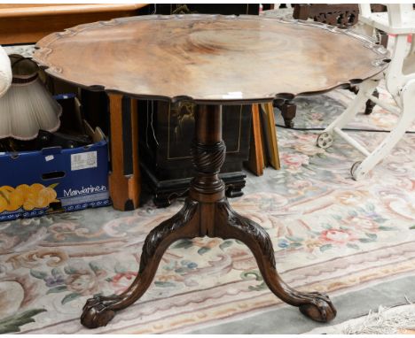 ***NEW GUIDE PRICE £300-400***A George III mahogany tilt-top tripod table, the shaped top with a pie-crust edge, raised on a 