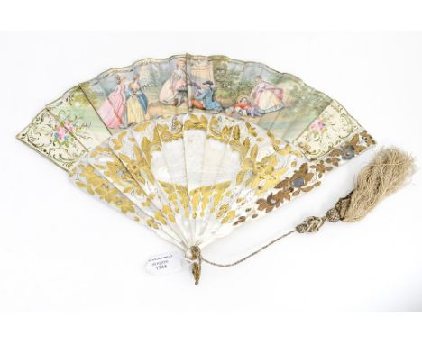 A 19th Century French hand held paper fan, gilt mother of pearl stick, the paper fan painted in watercolour with Watteau type