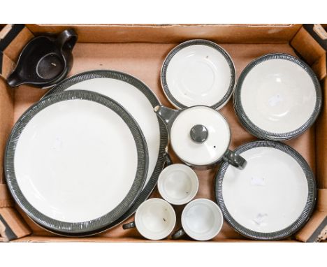 A Poole Pottery 1980s black rim and cream dinner service/tea service, plus a black Midwinter sauce boat